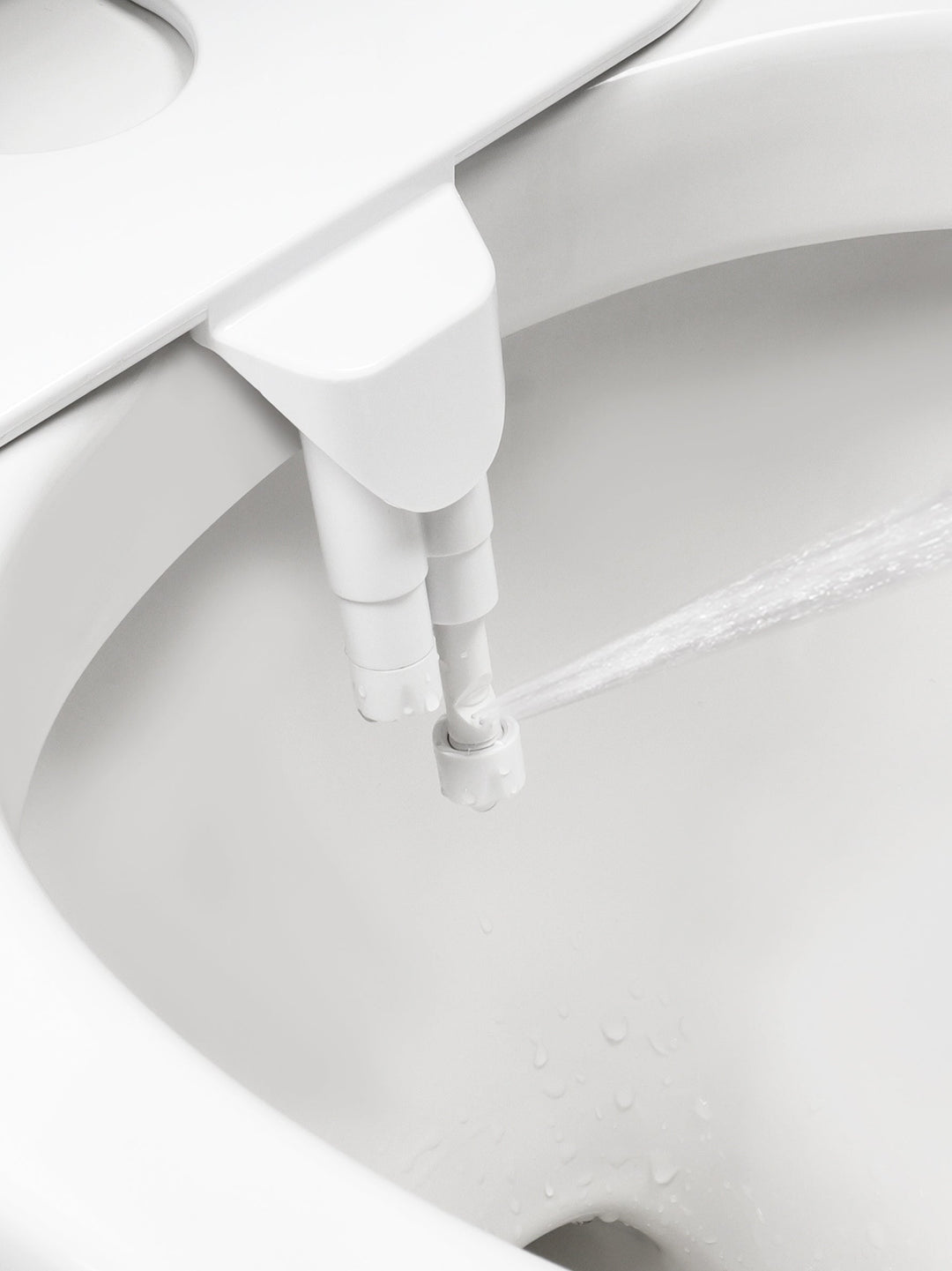 Vue de près du jet d'eau mode femme en action du bidet  BelmaJet by BelmaClean 